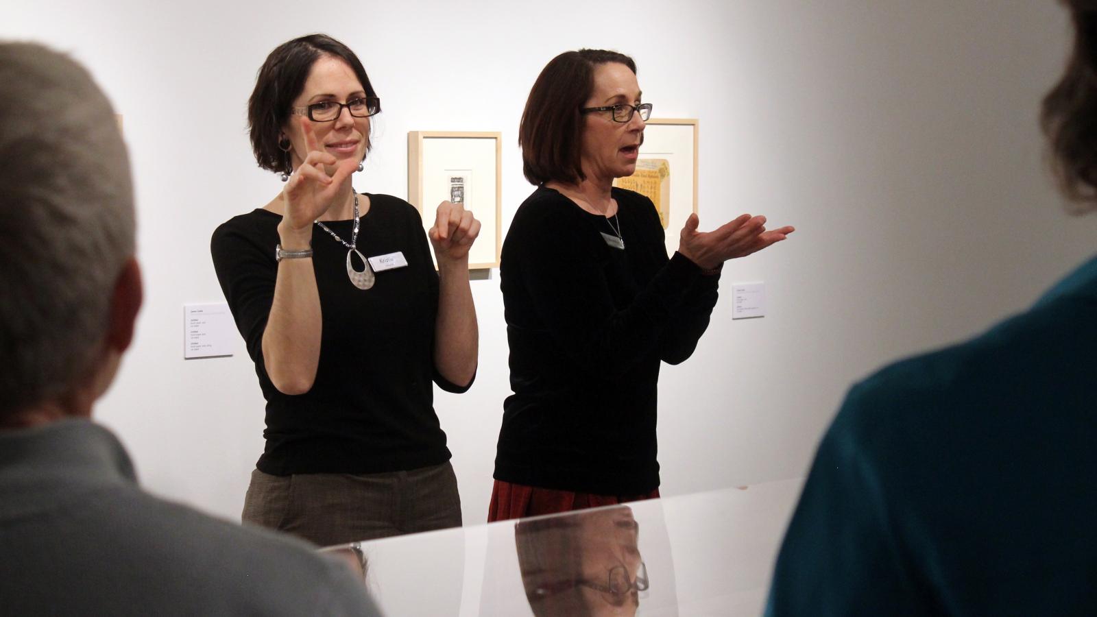 Brenda Brueggemann and ASL translator, photographed by Ada Matusiewicz