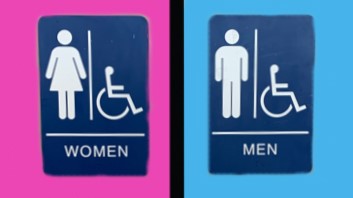 pink and blue bathroom sign 