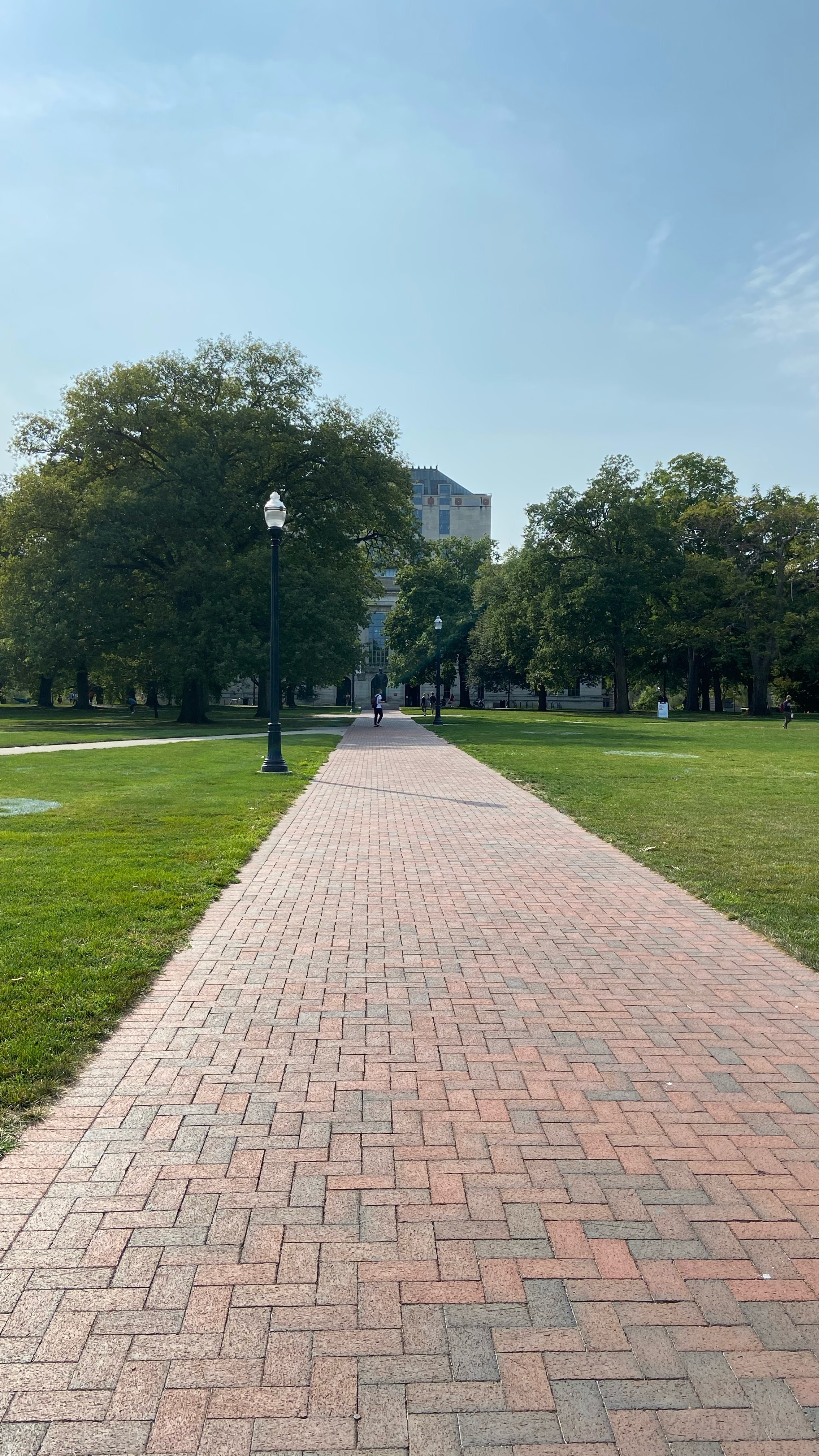 brick pathway leading to a library 