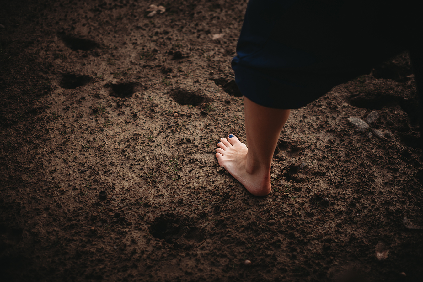 foot in the mud