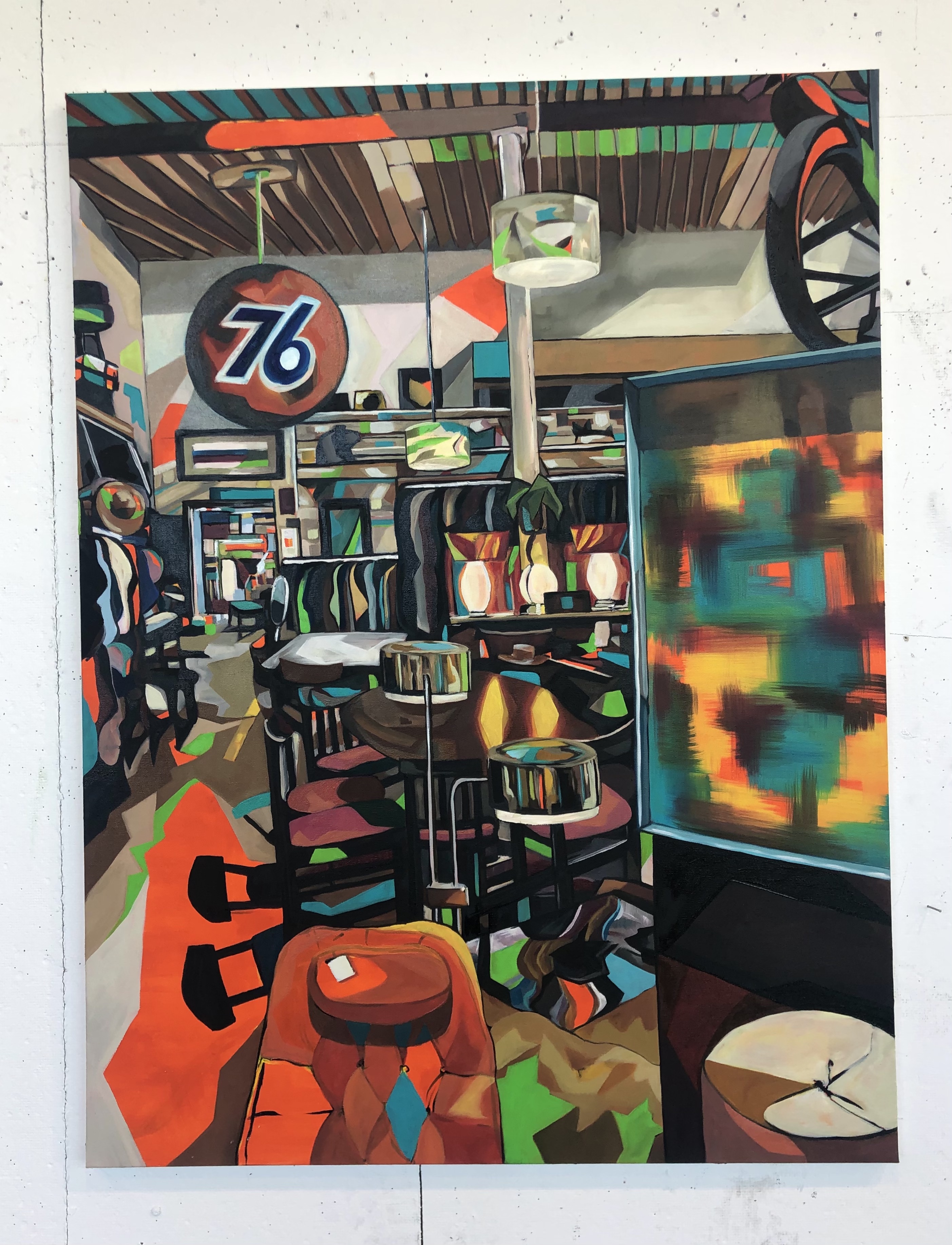 Painting of an antique shop. Every bit of space is filled on the several shelves and tables with objects of every color. In the bottom left corner are two bright orange objects, in the upper left corner is a circular sign that reads "76." The colors are bright and chaotic, giving a sense of busyness.
