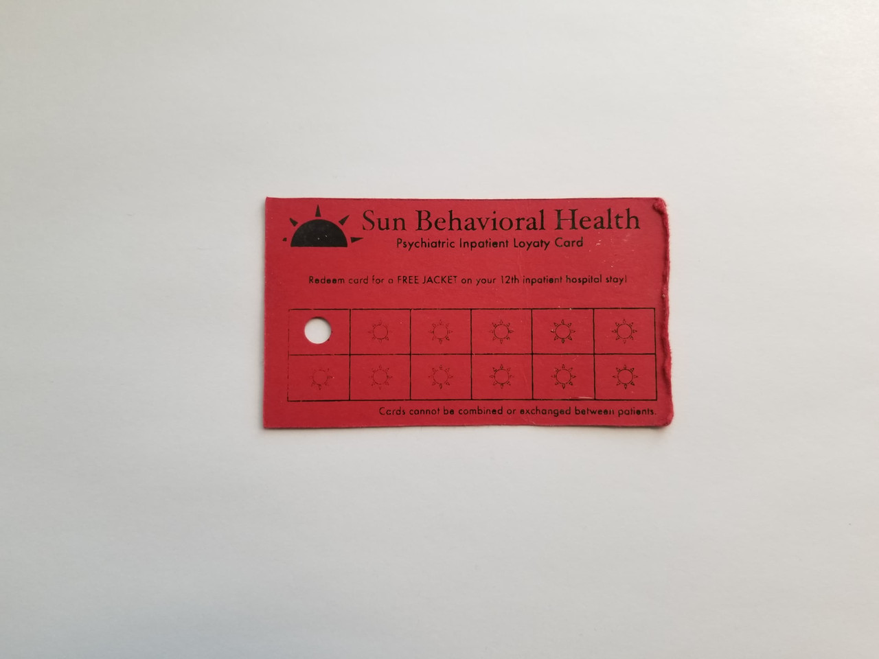 screen printed card referencing a customer loyalty points card but for a psychiatric facility 