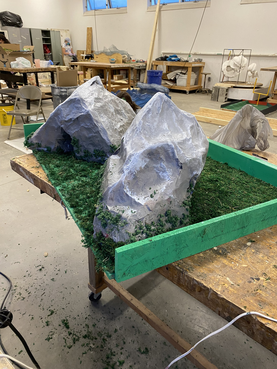 sculpture of mountains, reminiscent of a miniature golf course