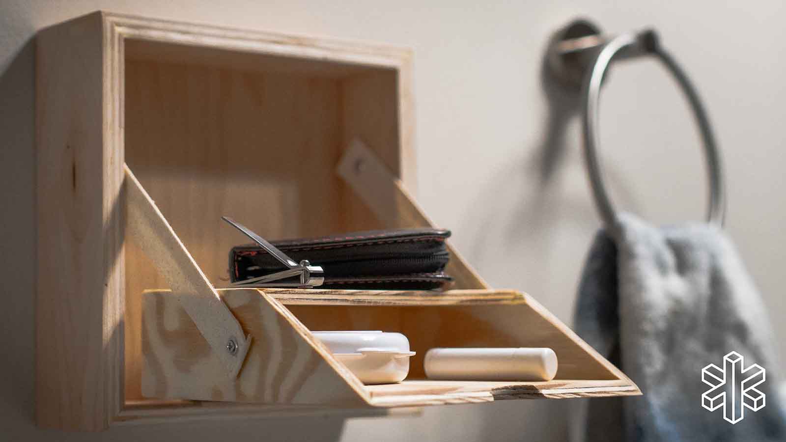 wooden box with pull-out tray containing personal items
