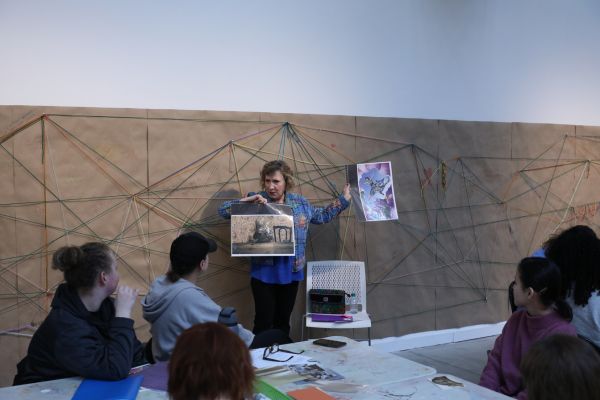 MJ Abell giving a collage demonstration to the workshop participants