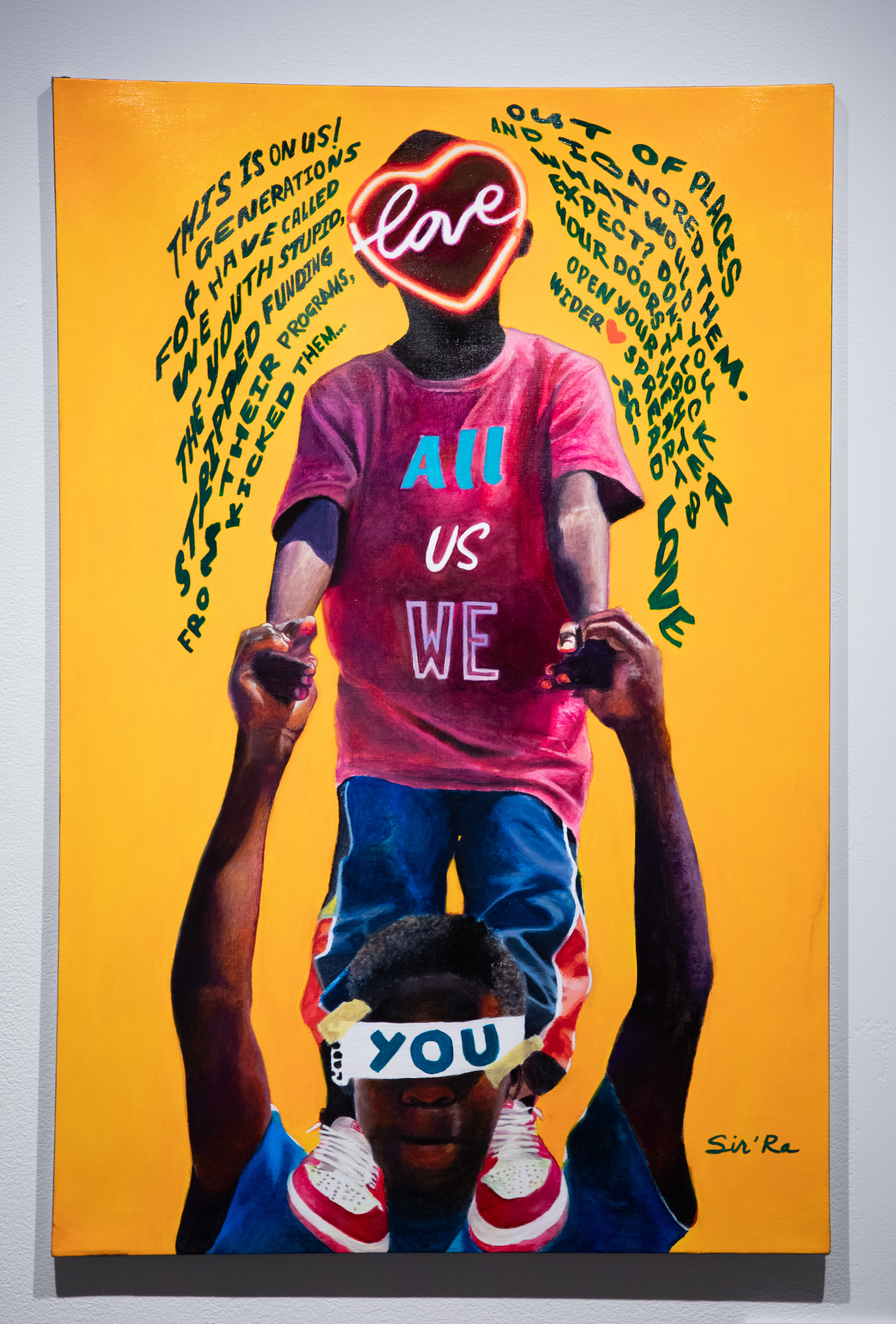 Painting of a kid standing on his Dad's shoulders surrounded by words 