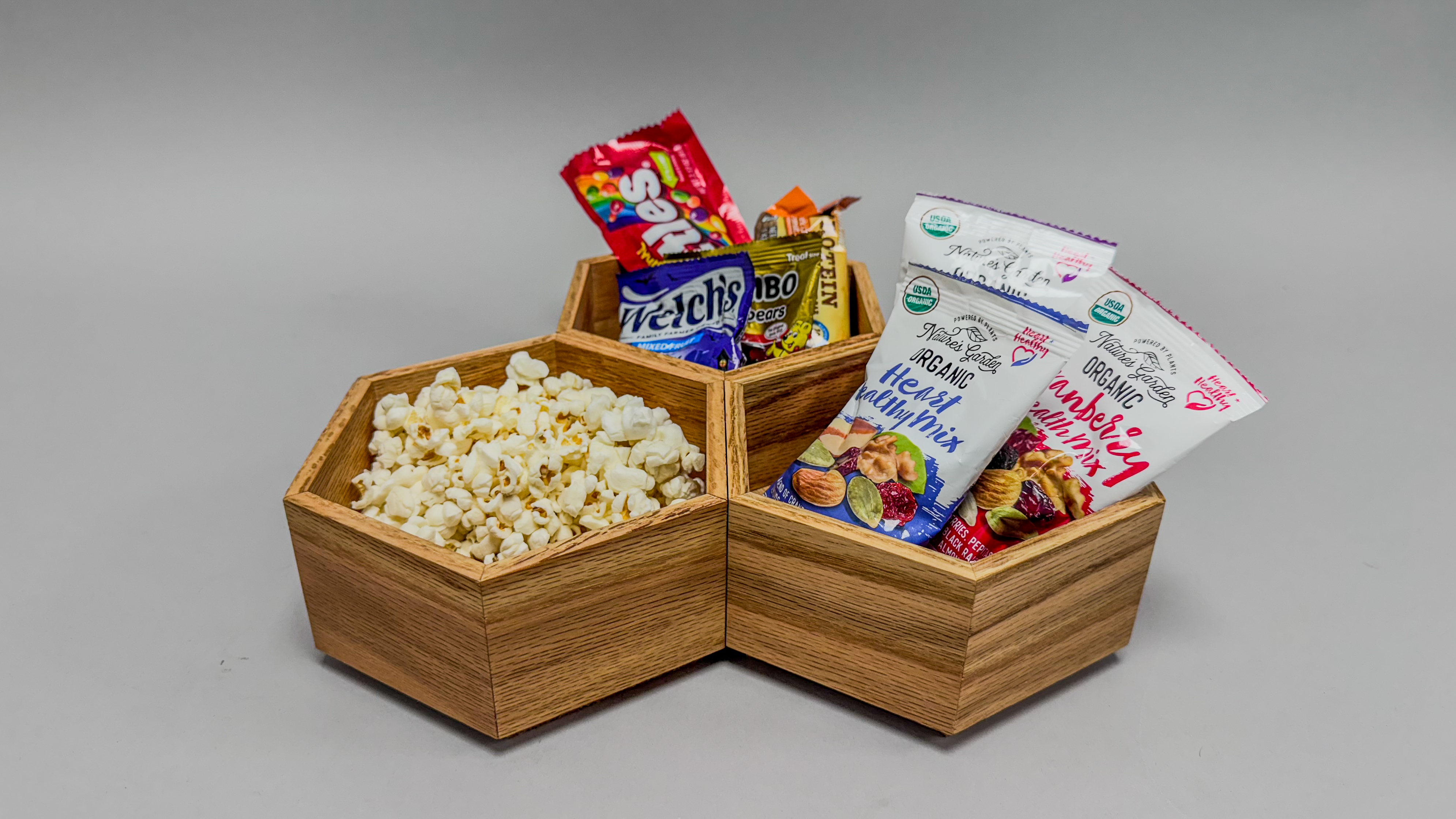 snacks inside hexagonal wooden boxes