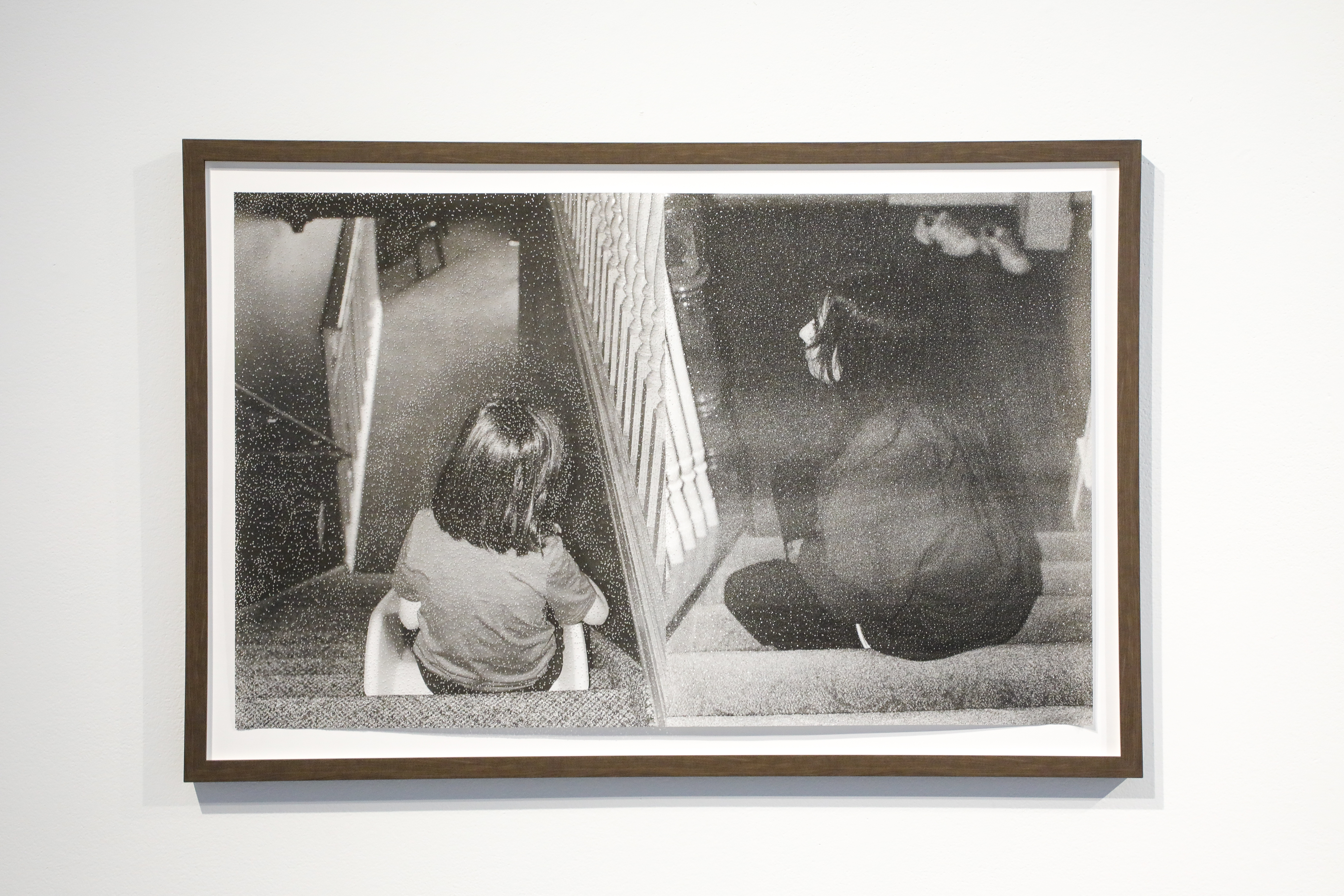 black and white photo of two kids on stairs