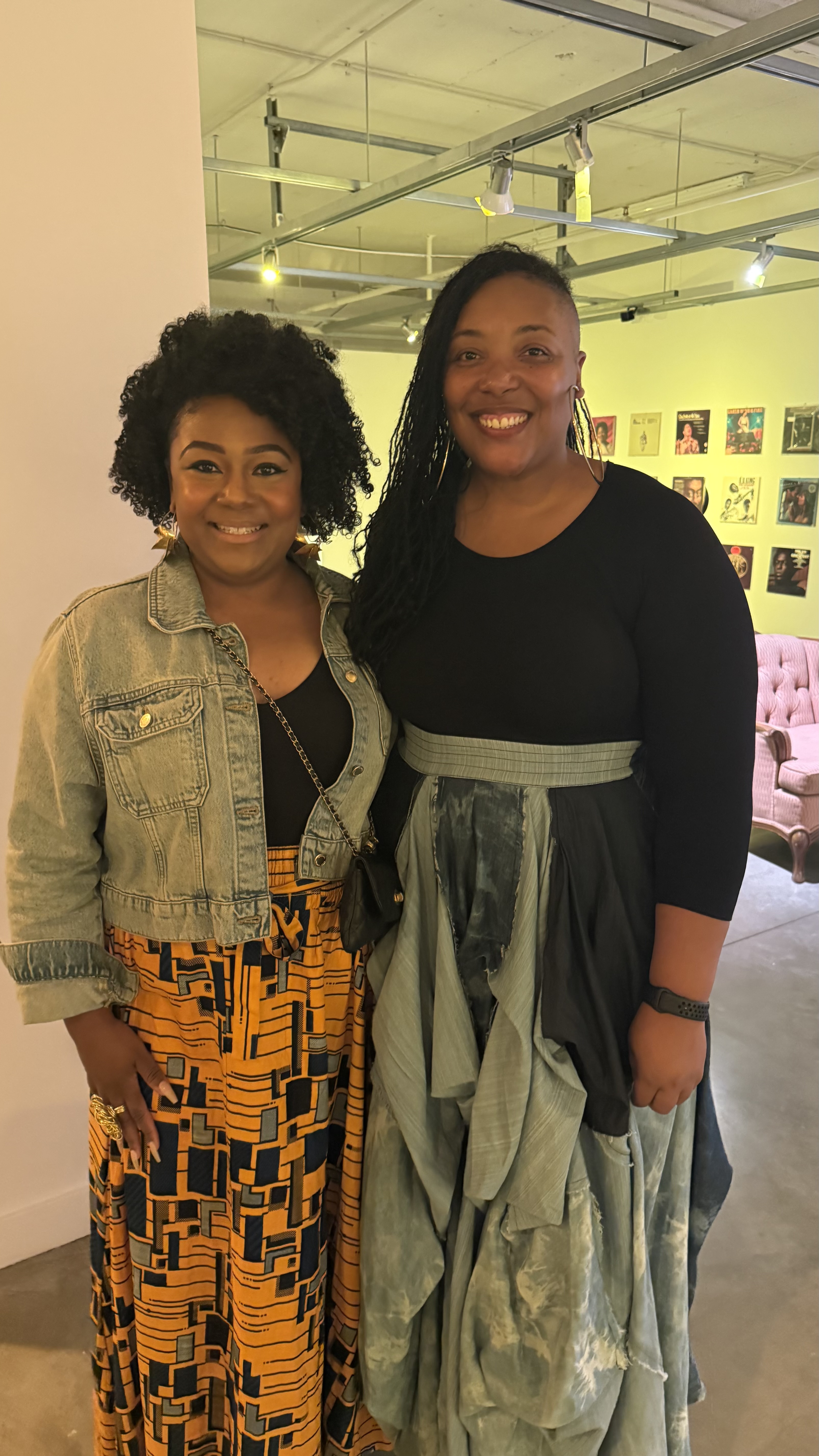 Keya and Tyiesha smiiling at the gallery