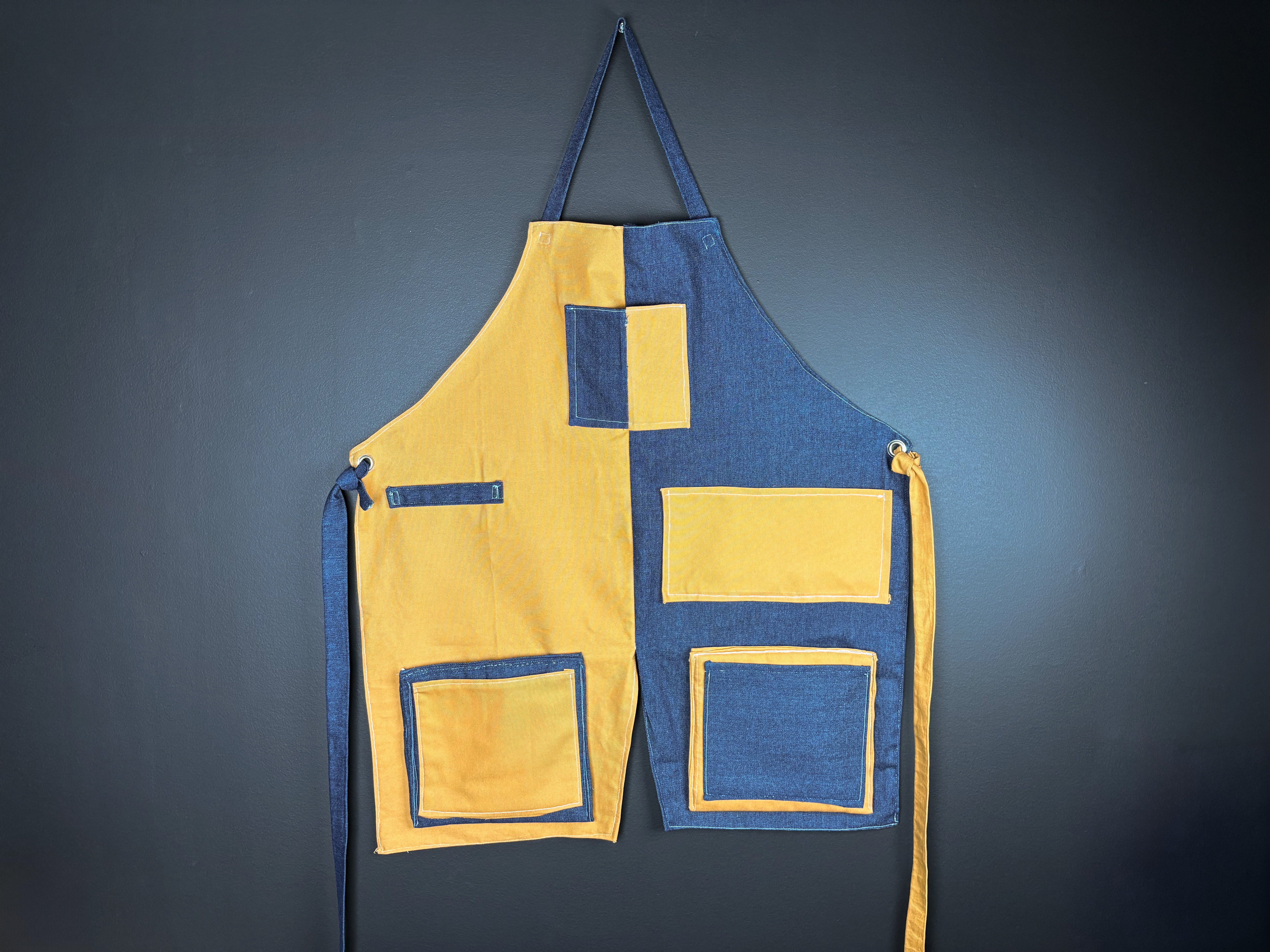 yellow and blue apron with pockets