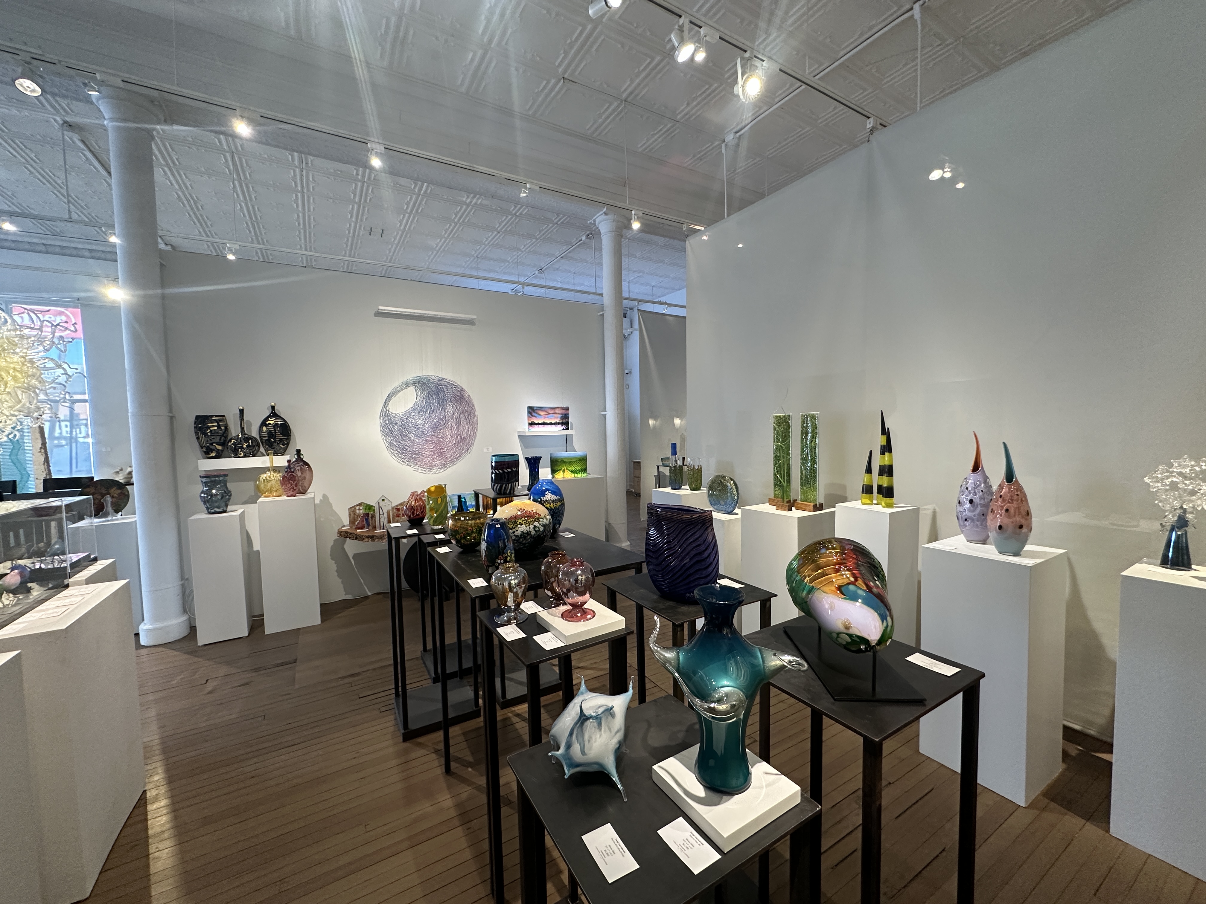 wide view of hawk galleries with glass sculptures
