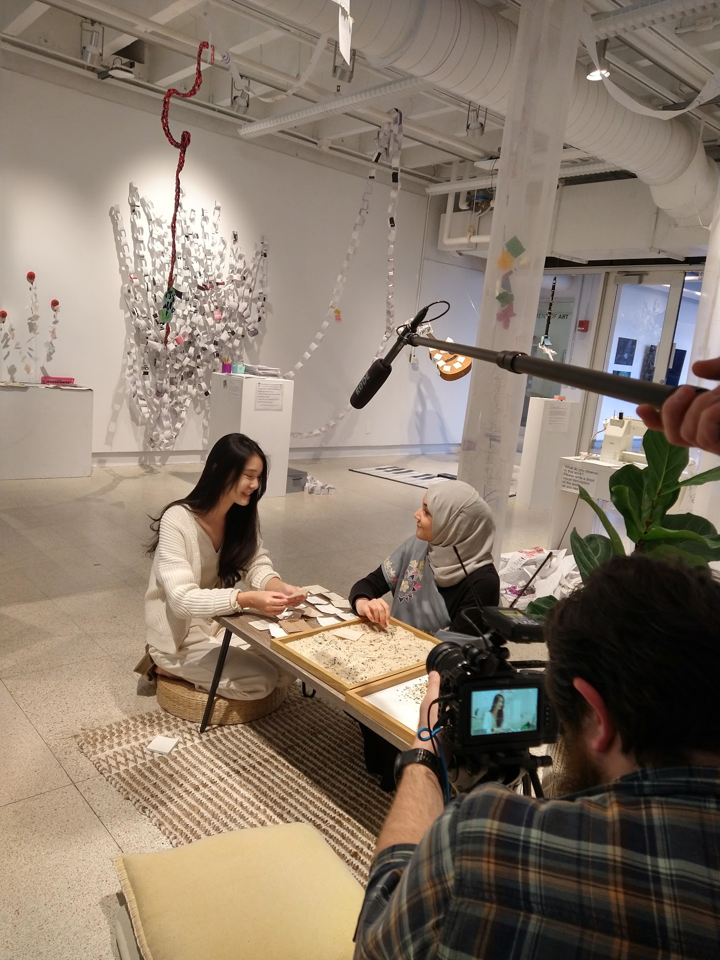 Xiaoxiao being interviewed at Hopkins Hall Gallery