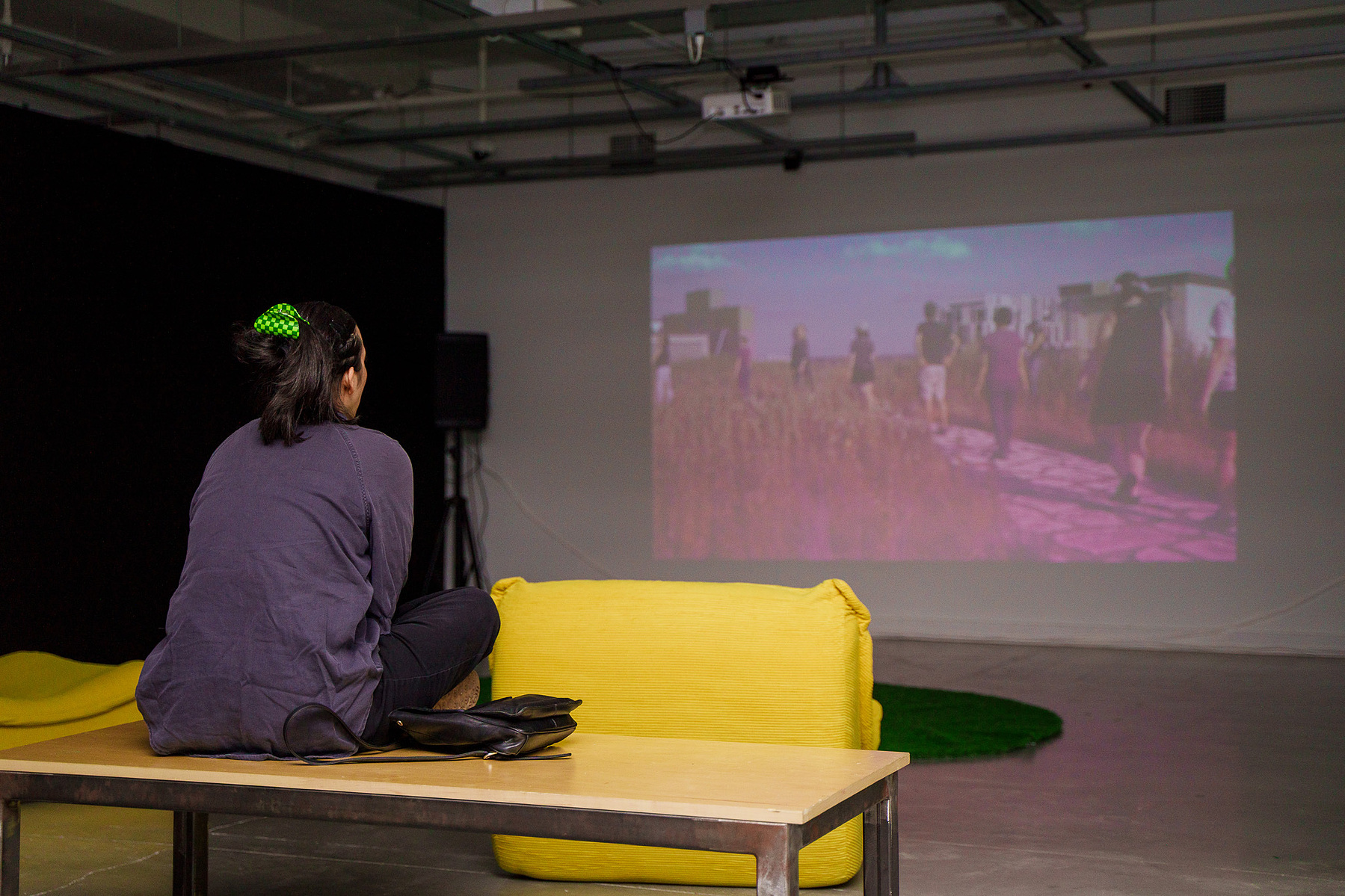a person watching a video of the audio rooftop experience