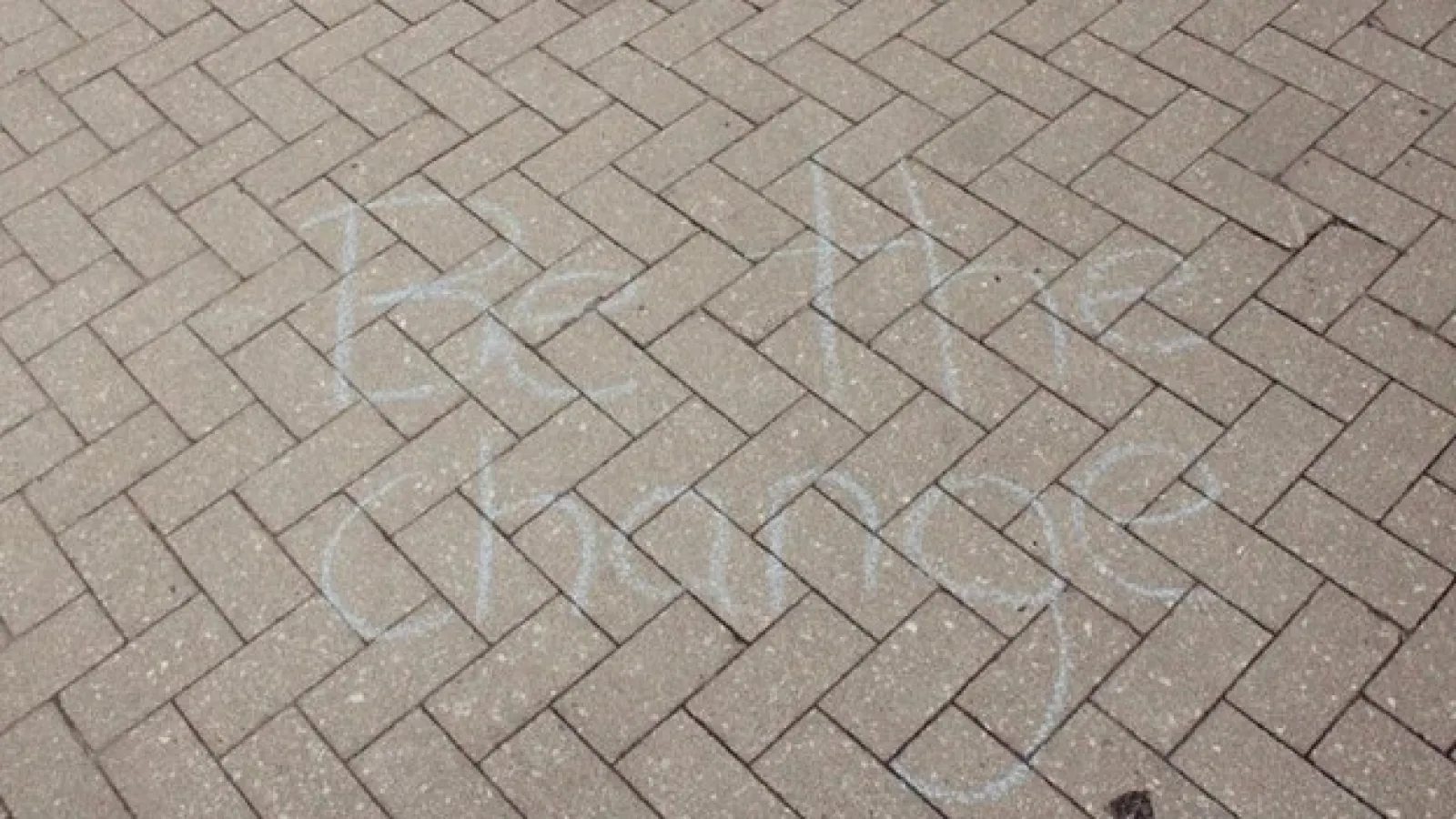 sidewalk chalk: "Be the Change"