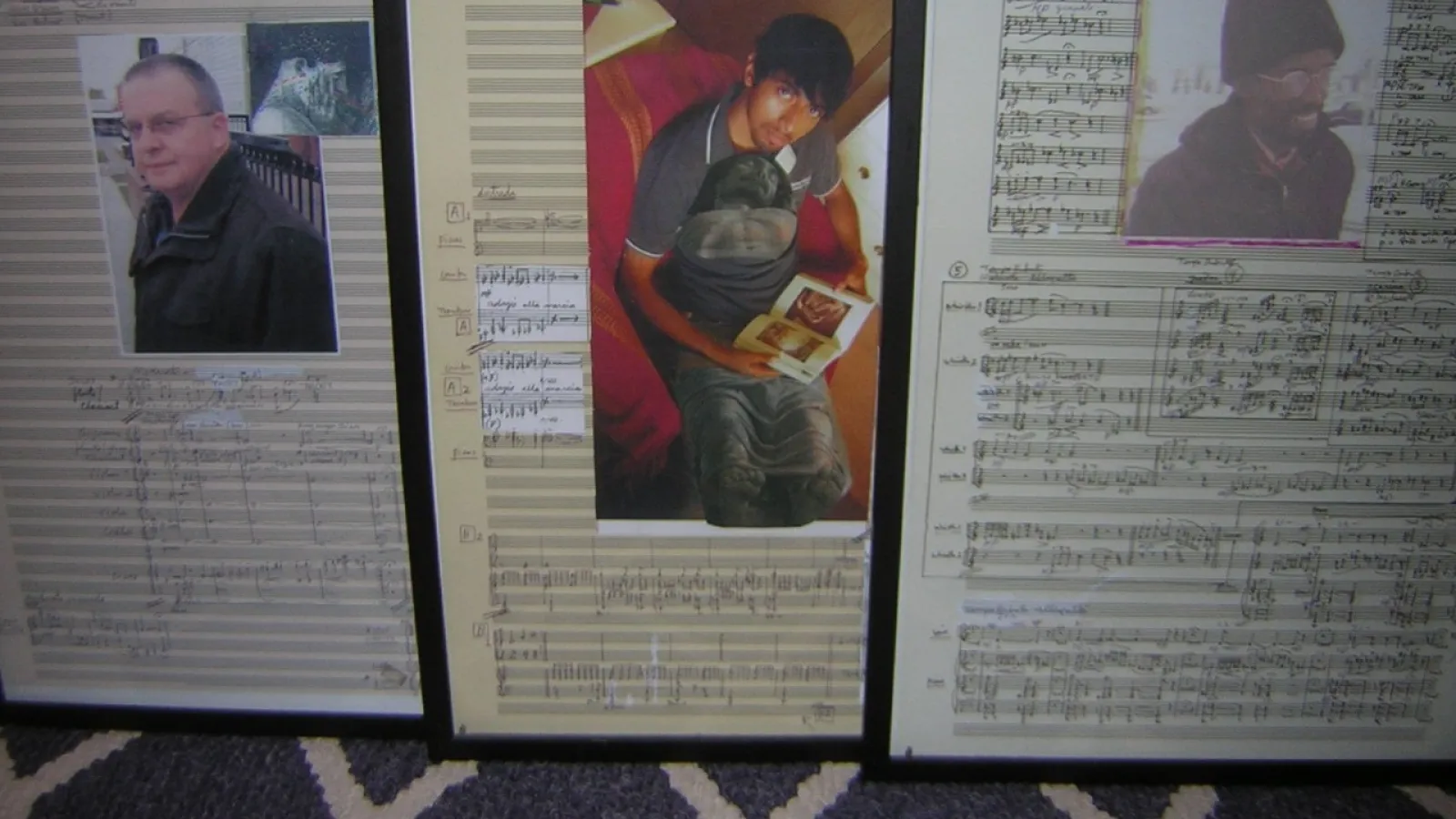 Three framed photos of music sheets with portraits in the middle of each