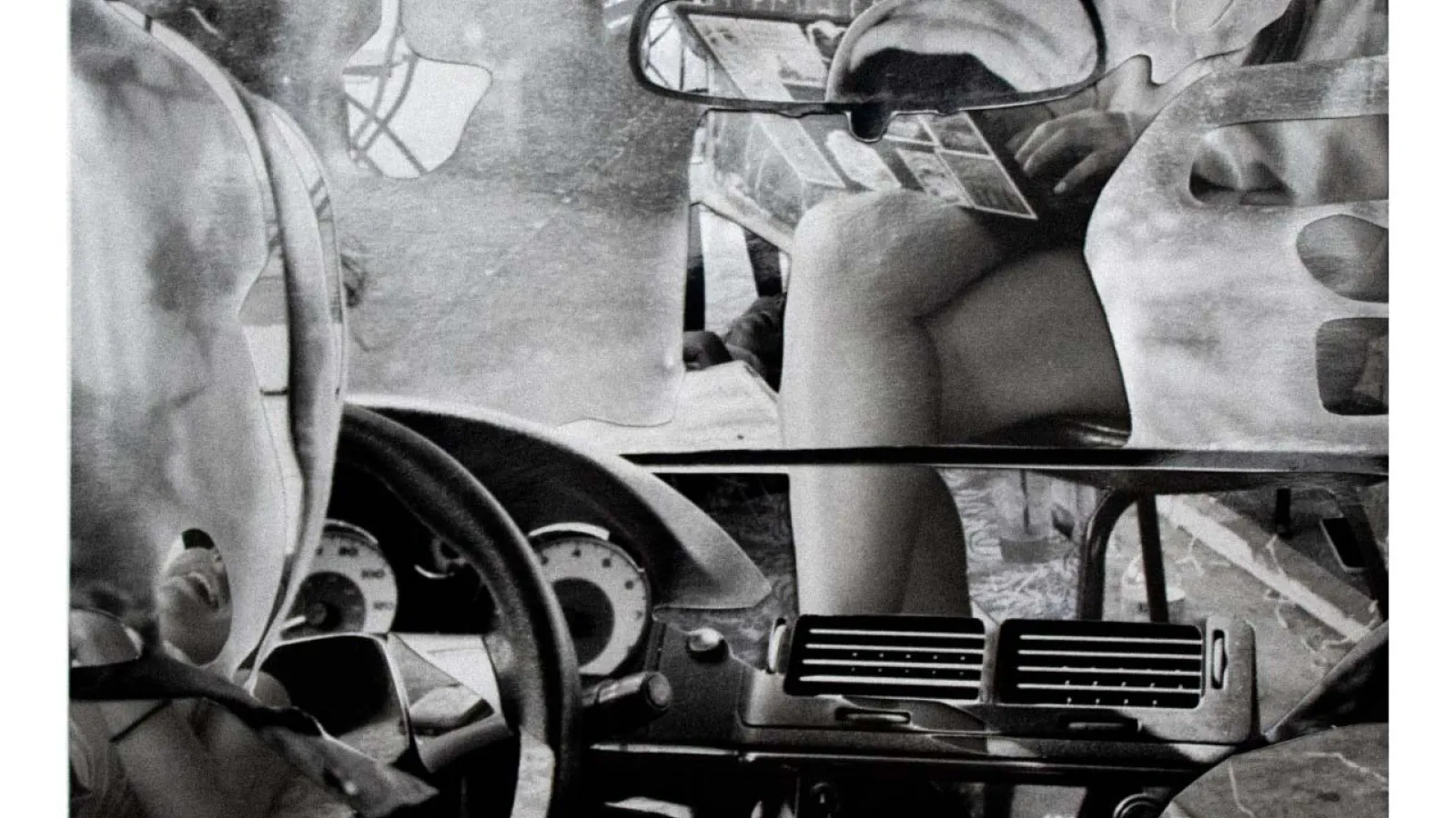 A black-and-white collage of photographs including the inside of a car and a person with a laptop on their lap
