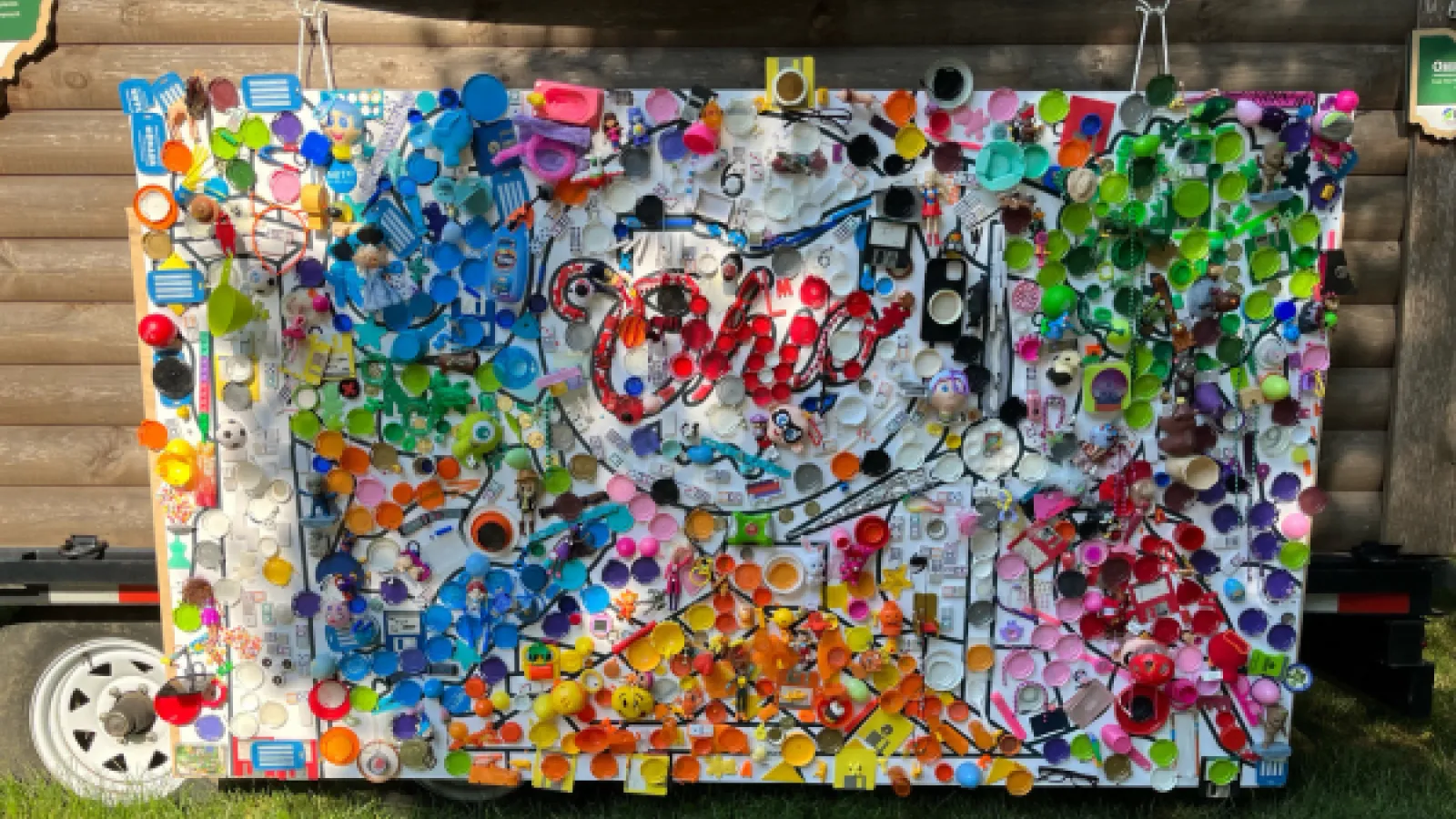 Colorful mural made from recycled materials that features Ohio