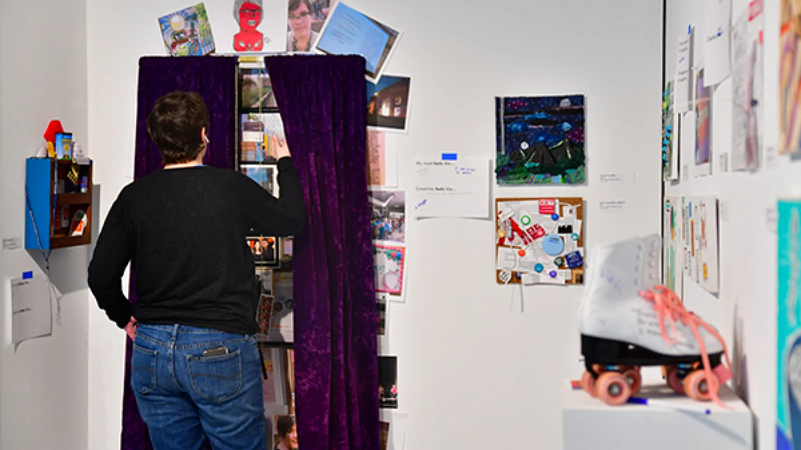 A viewer interacting with an installation in the exhibition titled Trace Layer Play 3.