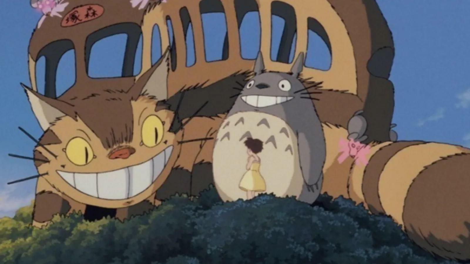 A still image of Catbus, Totoro, and Satsuke from My Neighbor Totoro.