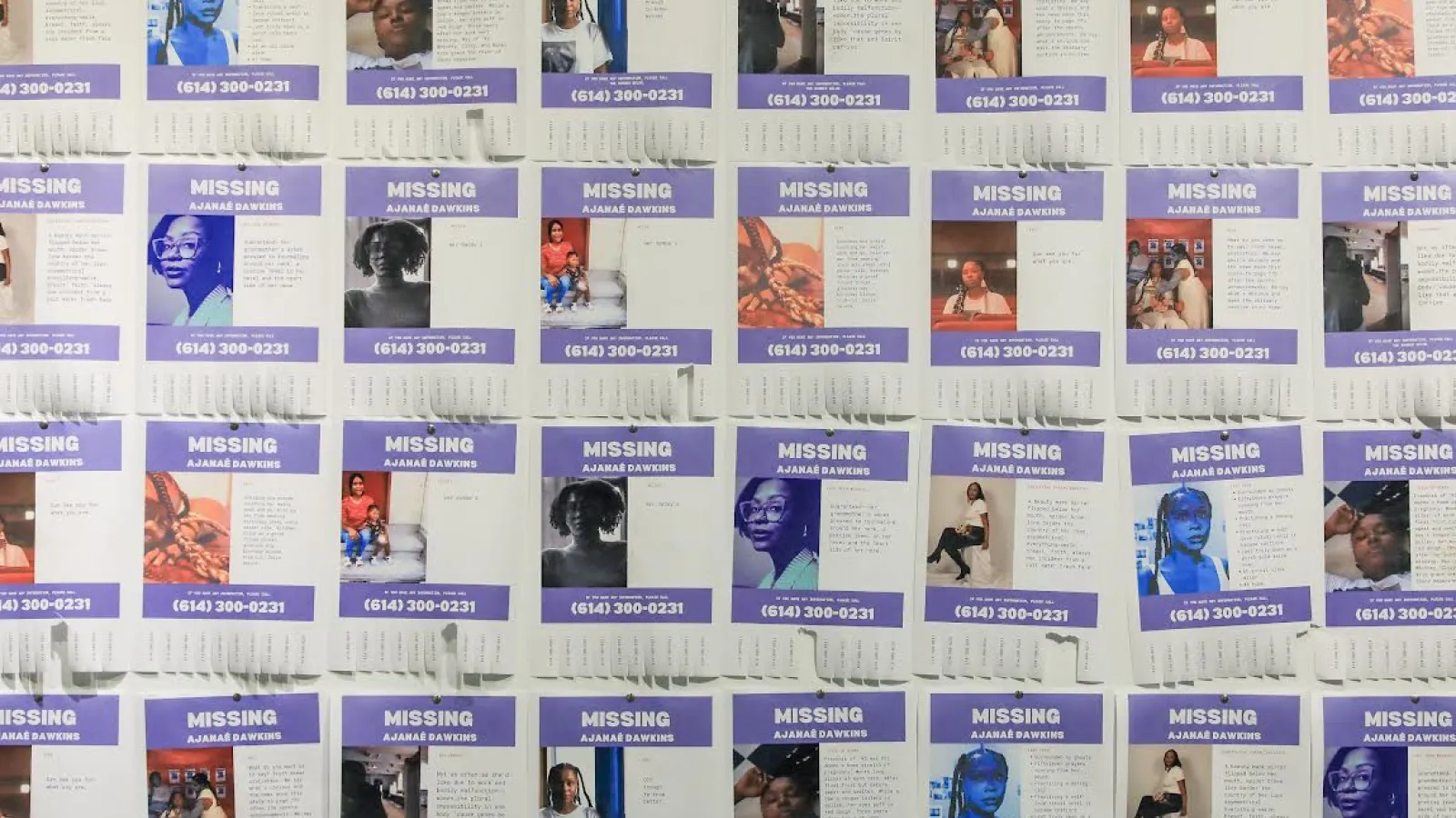 Missing posters featuring photos of Ajanaé filling up an entire wall of the gallery.