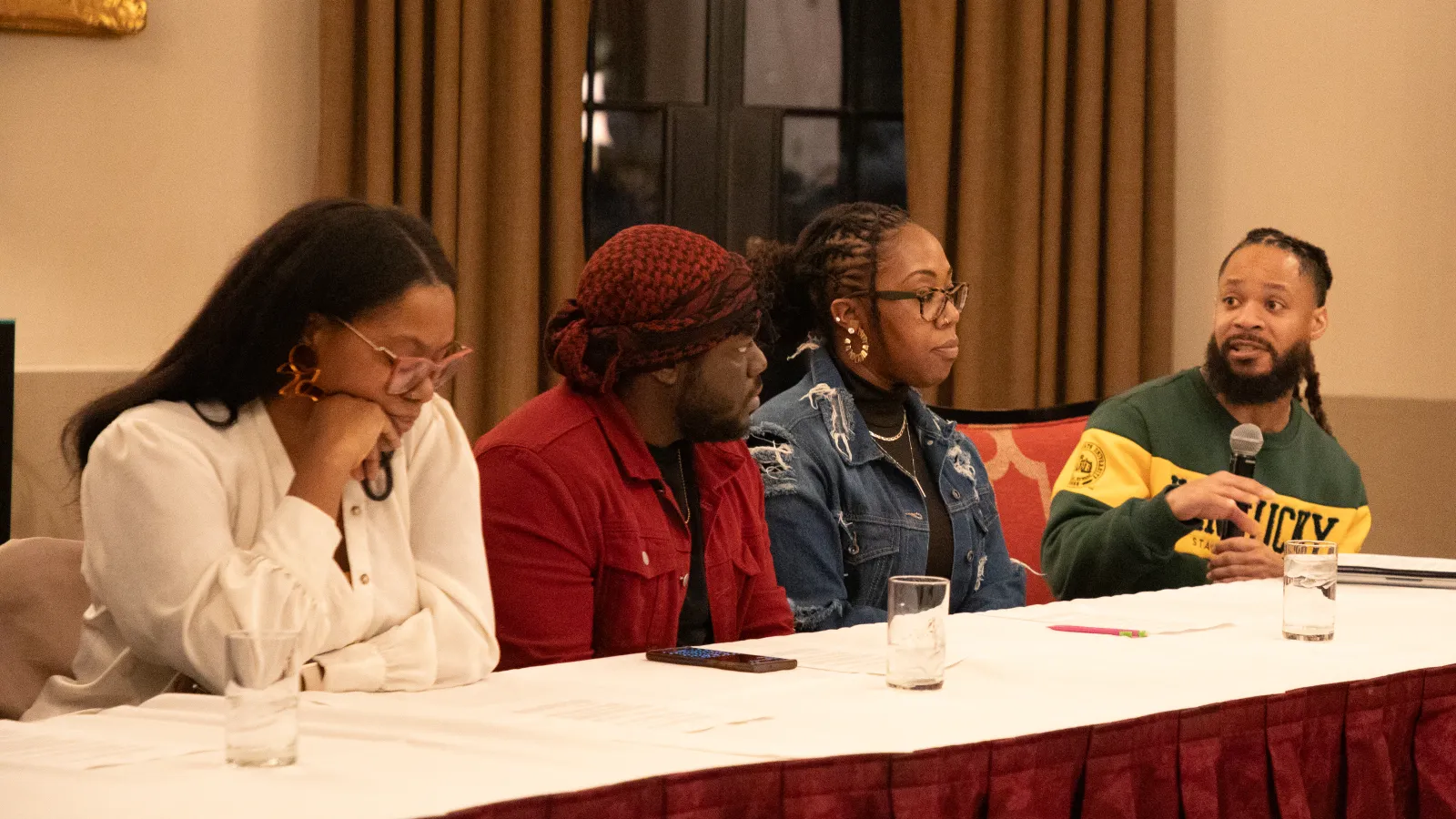 terron moderating a panel of black artists