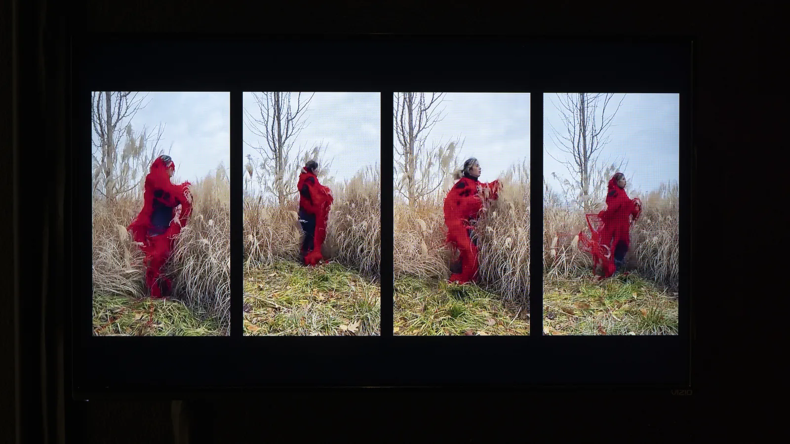 video with four panels of a person dressed in red, moving