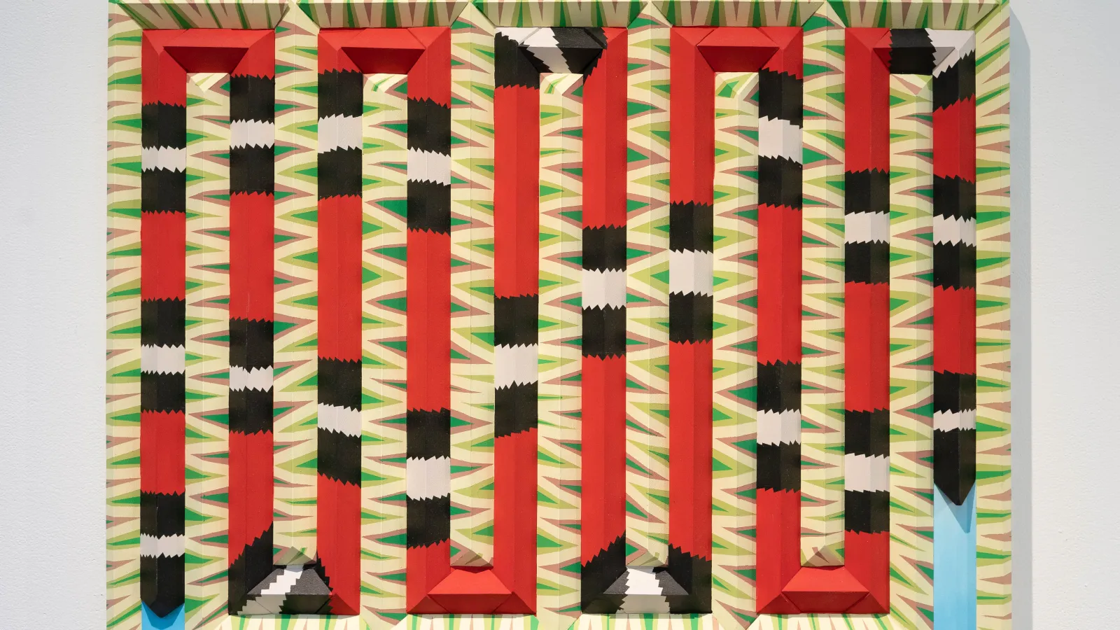 horizontal painting with snake-like lines in red, black, and green