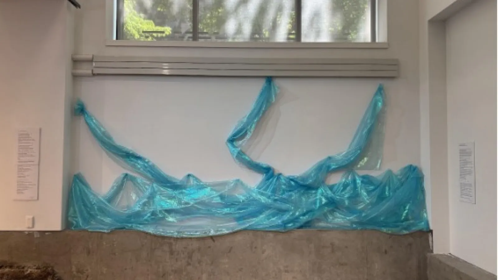 ohio river made from blue material on the gallery wall