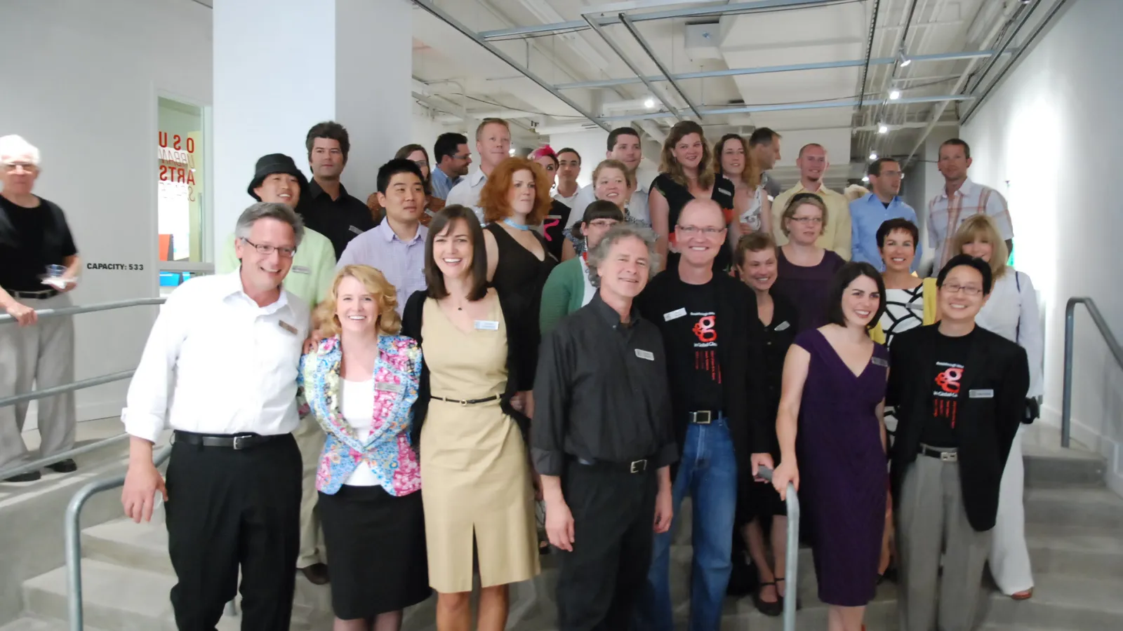 Artists and exhibition organizers celebrating the opening of BIGG.