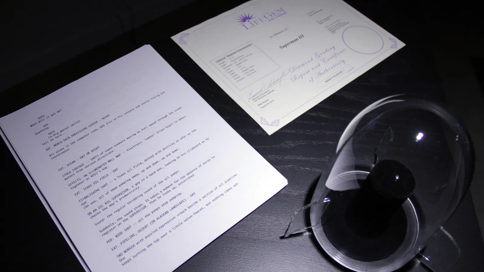 Image of Shane Mecklenburger: "Superman Diamond," diamond made from script of "Superman" (1983), glass, script pages, appraisal certificate, 2013