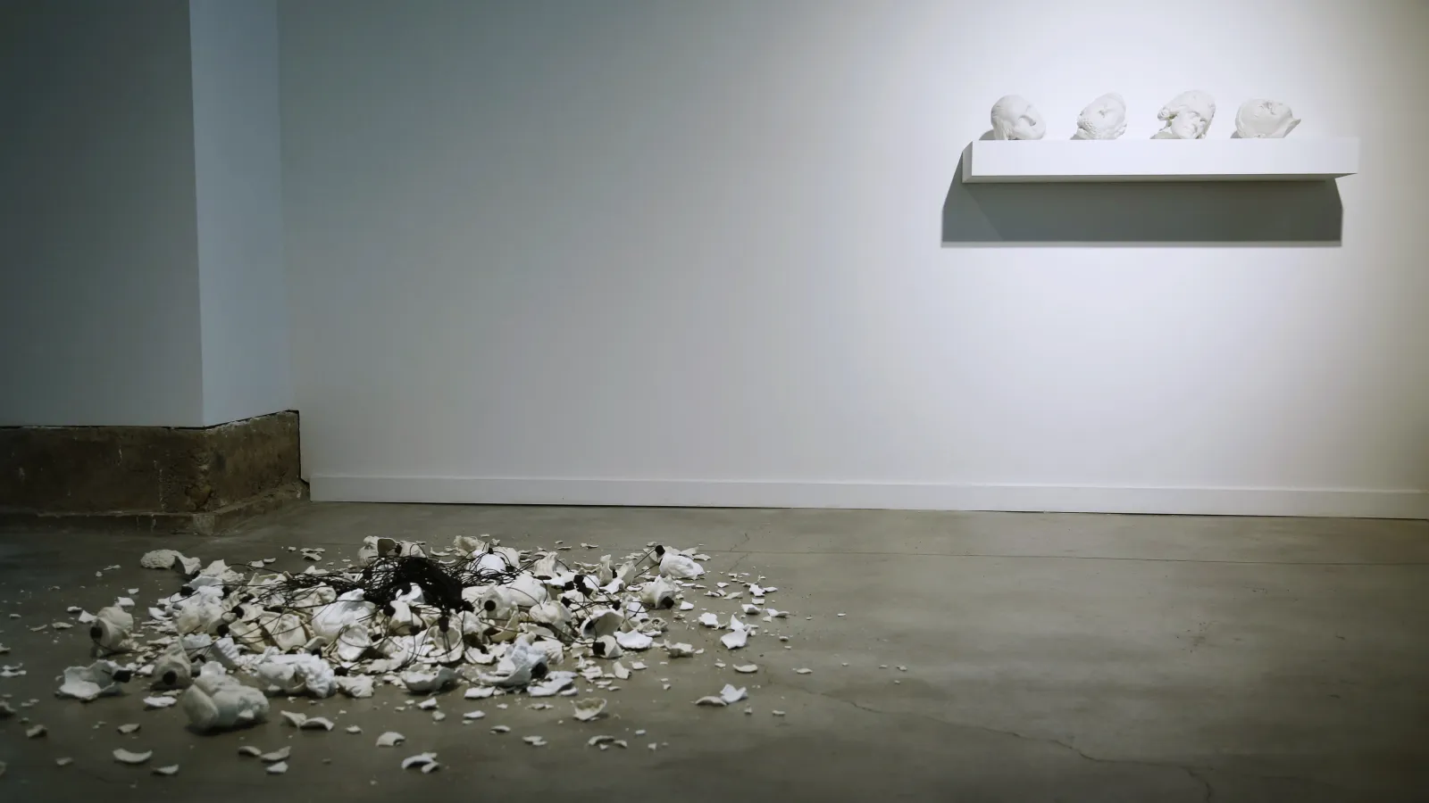 ceramic heads broken and on the floor
