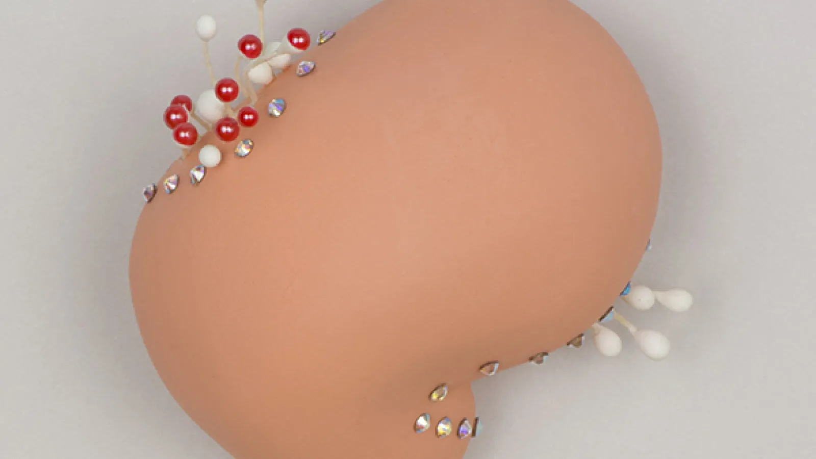 Bethany Haeseler: "(will this define you?)," shadowbox, cast plaster, Swarovski crystals, artificial stamens, paint, 2014