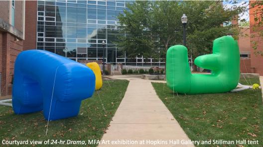 large colorful blow-up shapes in courtyard