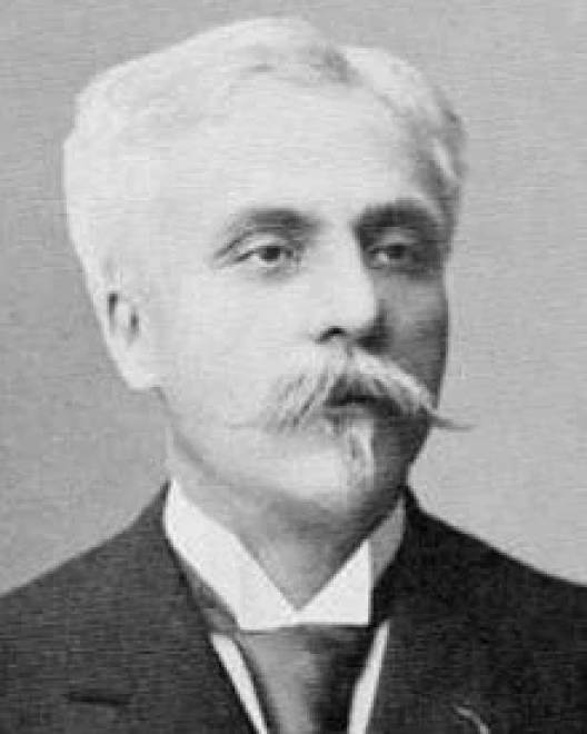 A black-and-white photograph of Gabriel Fauré