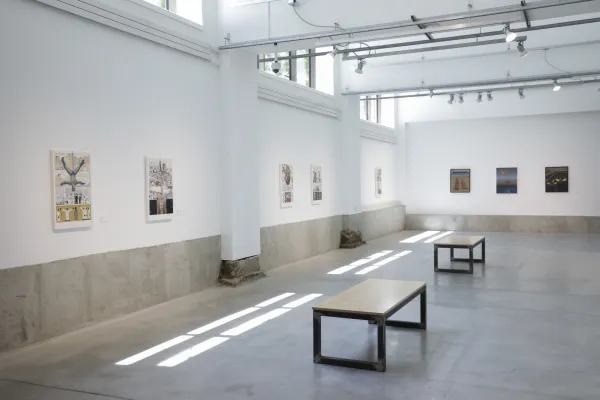 The walls of Urban Arts Space filled with paintings by Glenn Holland
