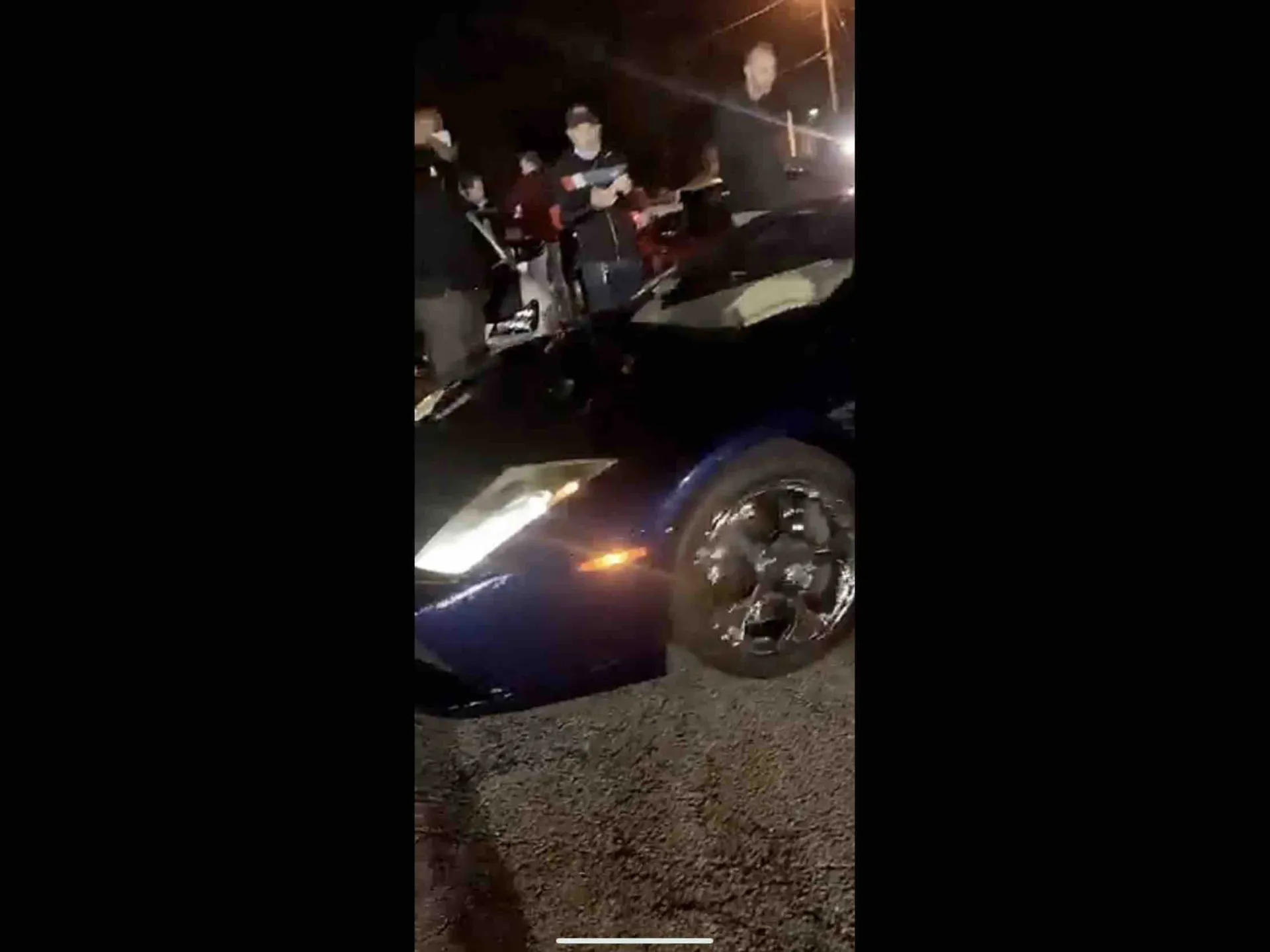 blue car at night 