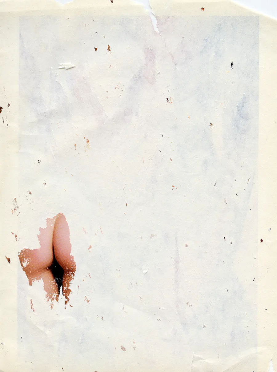 exposed woman's buttocks on white background