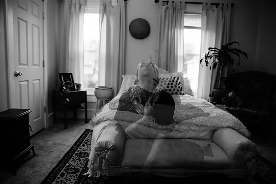 black and white image of bedroom 