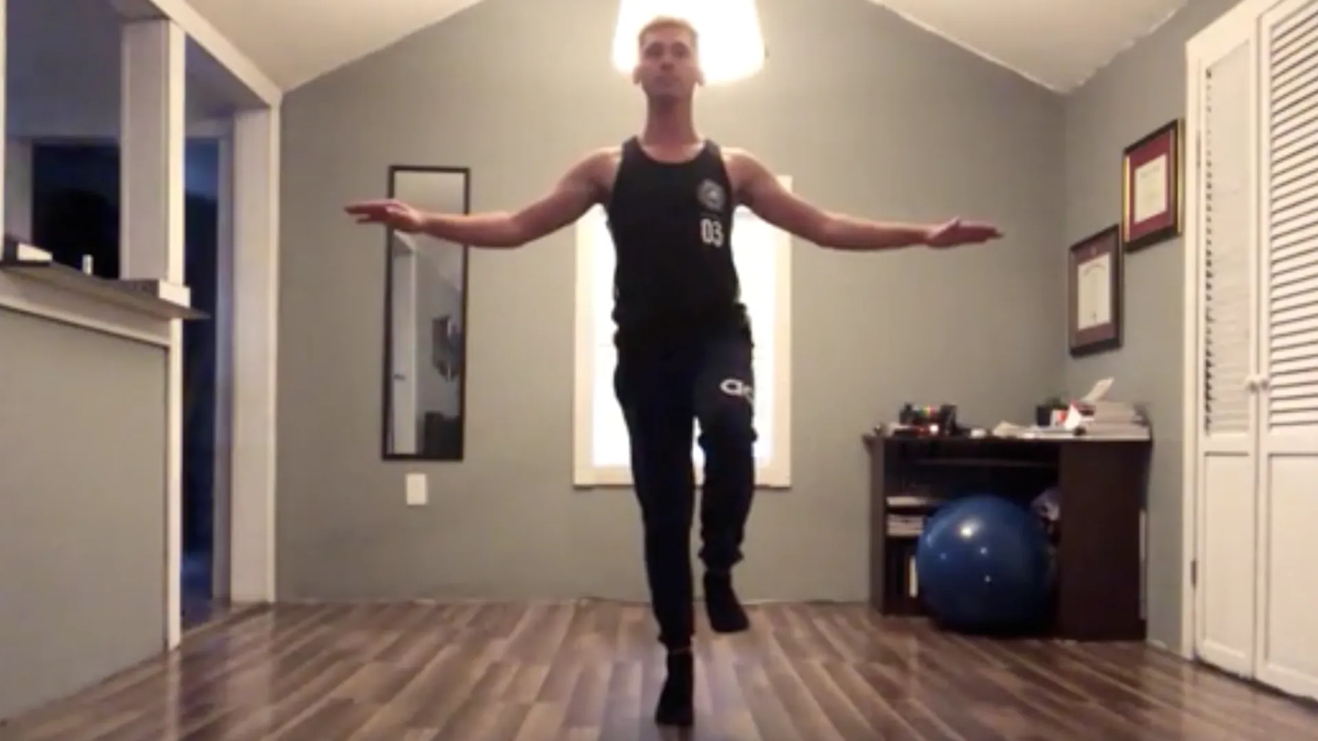 A dancer in a living room.