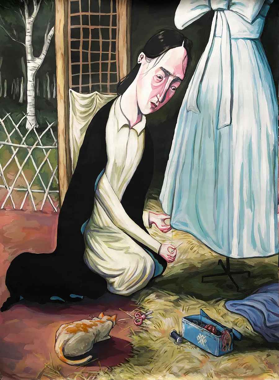 A dressmaker sews the hem of a blue dress