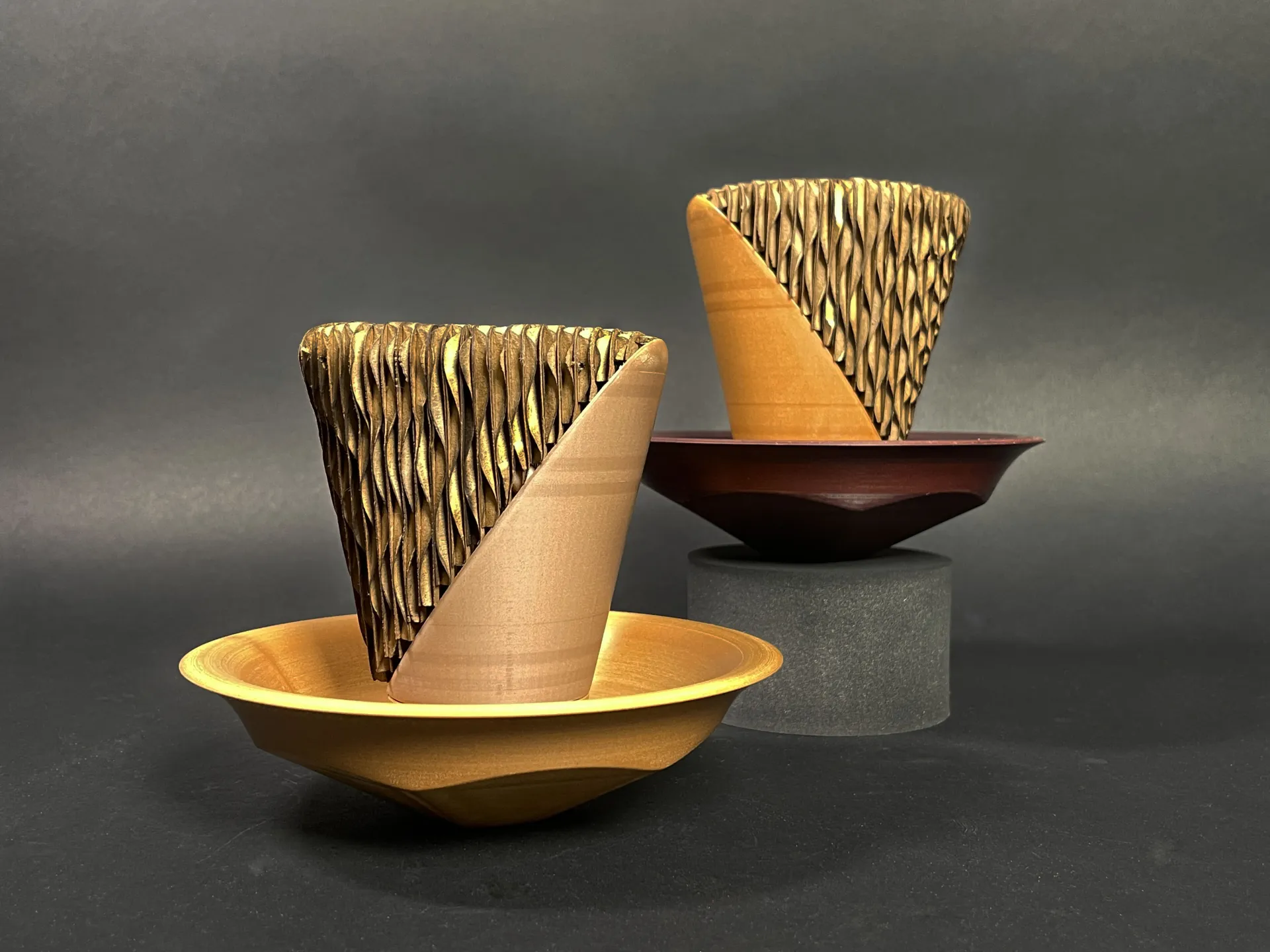 cup for holding items that is half made of cardboard