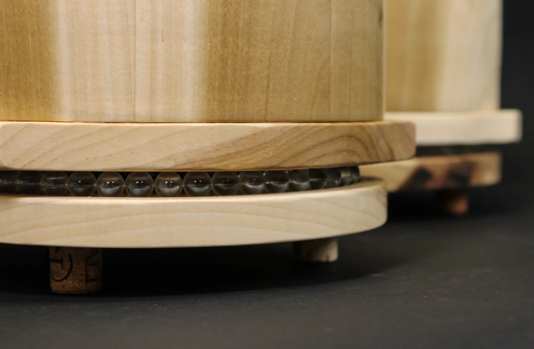 close up of the recipe rotary's base made of marbles