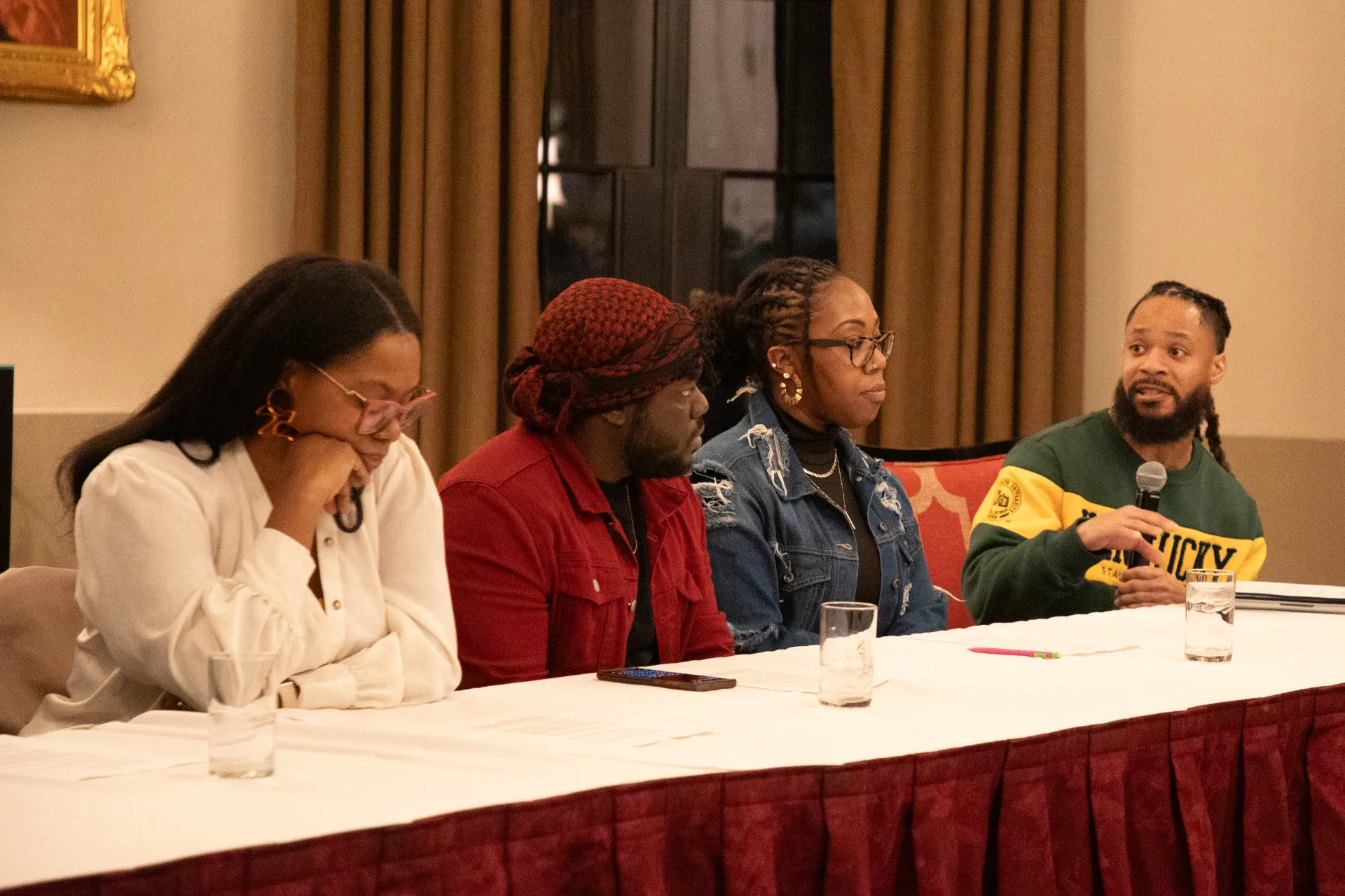 terron moderating a panel of black artists