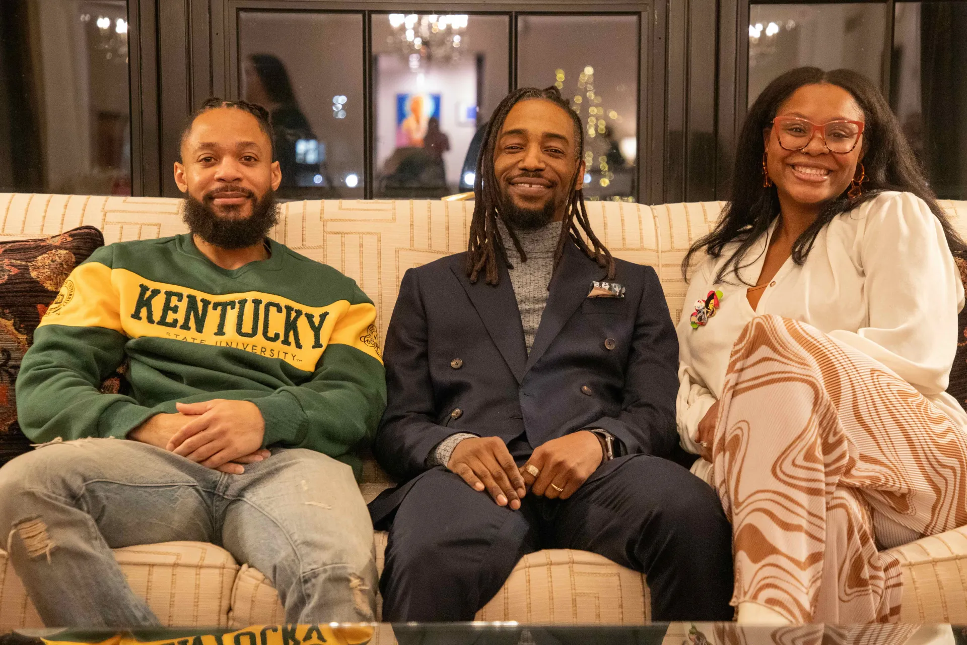 terron sitting with artists arris' cohen and ajanae dawkins