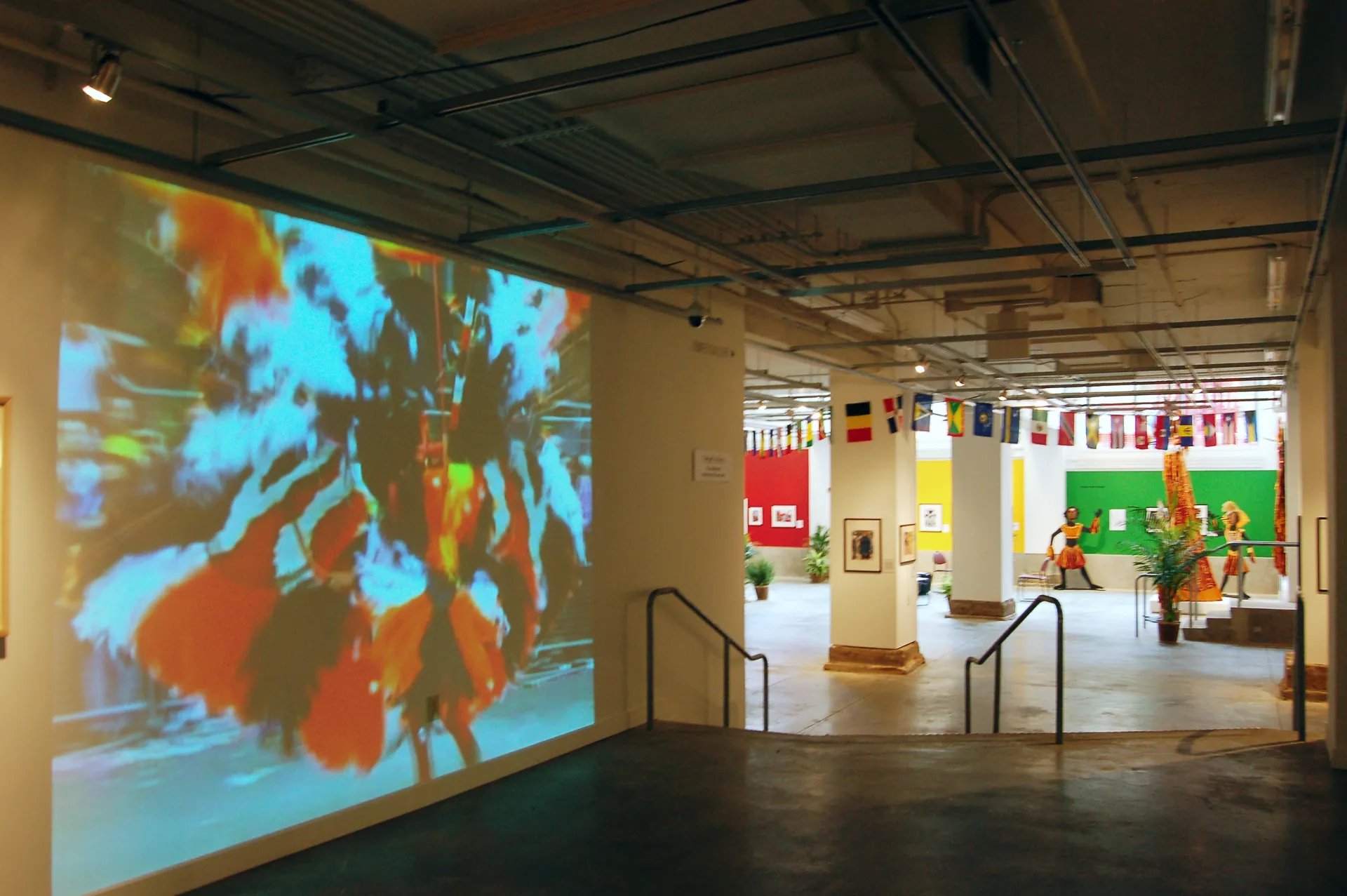 Image of a video projection at the entrance of UAS during the Midnight Robbers Exhibition