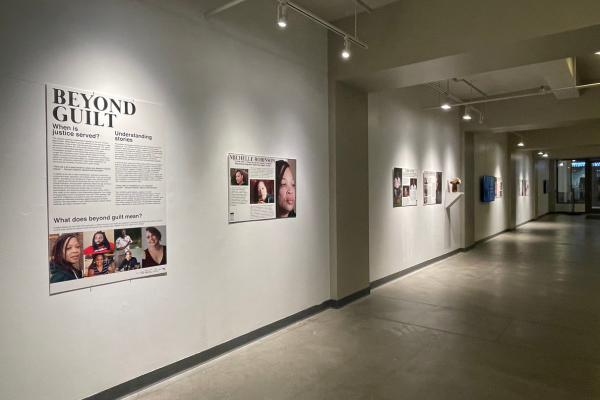 Beyond Guilt signs in the Urban Arts Space corridor