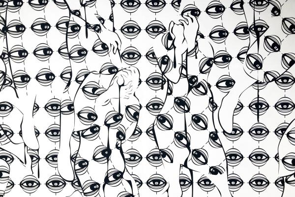 Eyes in the shape of figures covering their faces