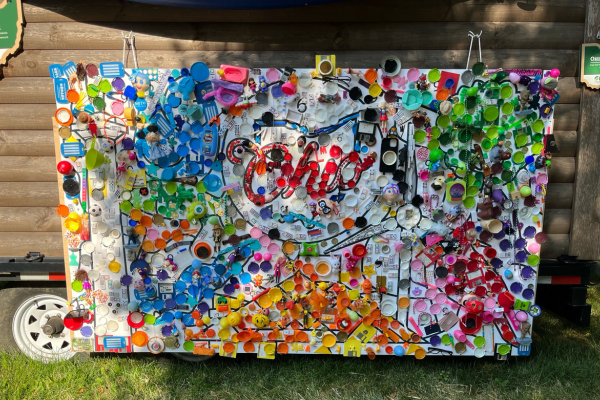 Colorful mural made from recycled materials that features Ohio