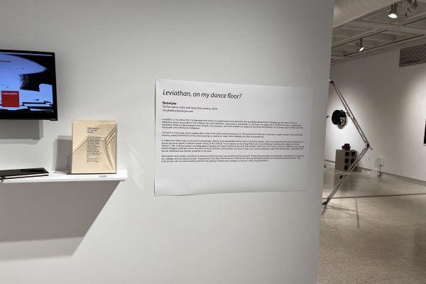 A photo of Banerjee's artist statement on the wall in Hopkins Hall Gallery  