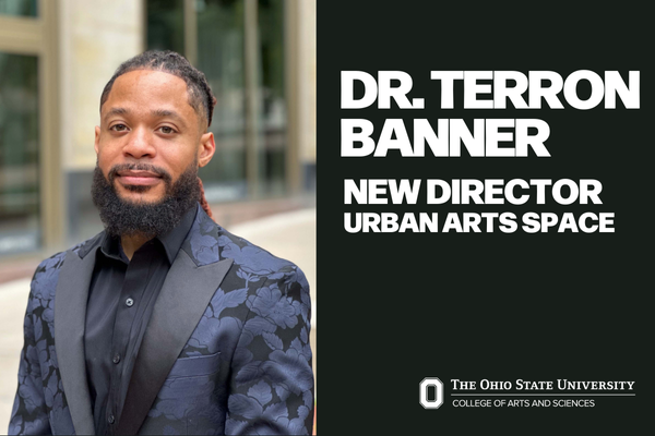 Dr. Terron Banner New Director Urban Arts Space with a photo of Terron wearing a suave blue suit